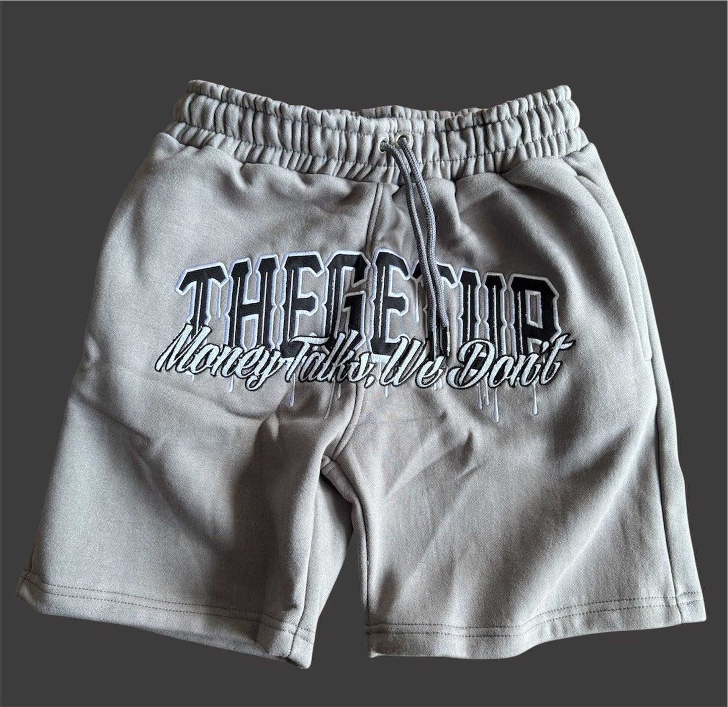 Black on grey “THEGETUP Money Talks, We don’t” shorts